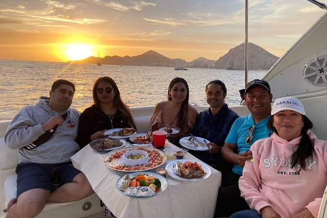 Cabo Arch Sunset Yacht Tour - Dinner & Drinks — Up to 18 Guests - Swimming, snorkeling, and floating near the shore