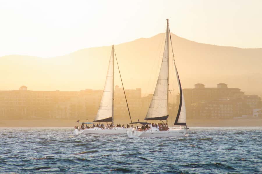 Cabo Luxury Sunset Sailing Adventure with Open Bar - Timing, clothing, and practical planning