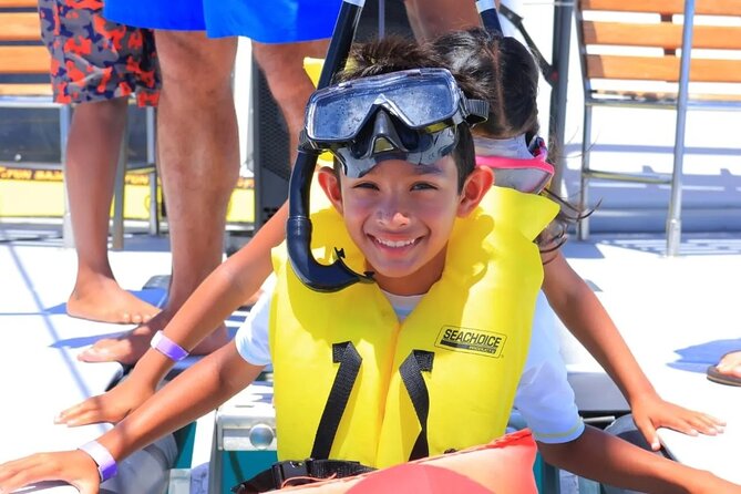 Cabo San Lucas Catamaran Cruise: Snorkel or Sunset Adventure - The open bar and onboard atmosphere