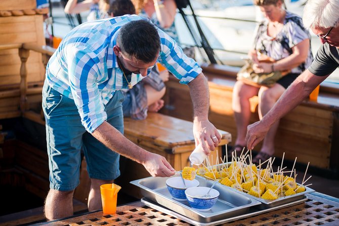 Cabo San Lucas Shopping, Tequila Tasting, and Snorkel Tour - Boarding the catamaran at midday
