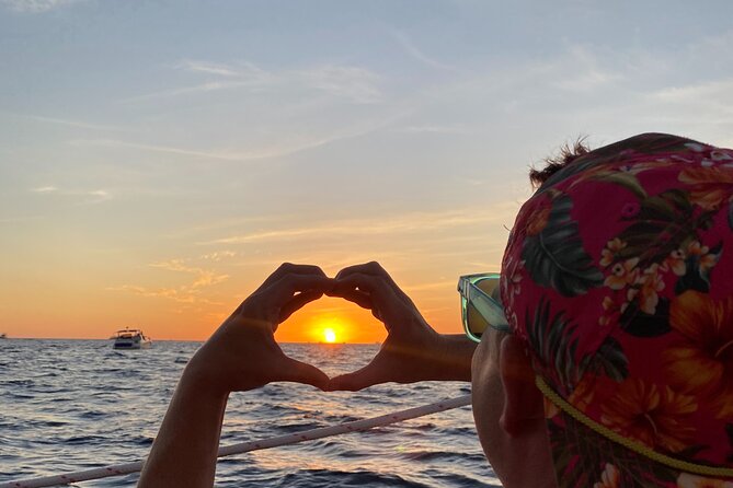 Cabo San Lucas Sunset Cruise with Open Bar and Snacks - Music, dancing, and the social mood onboard