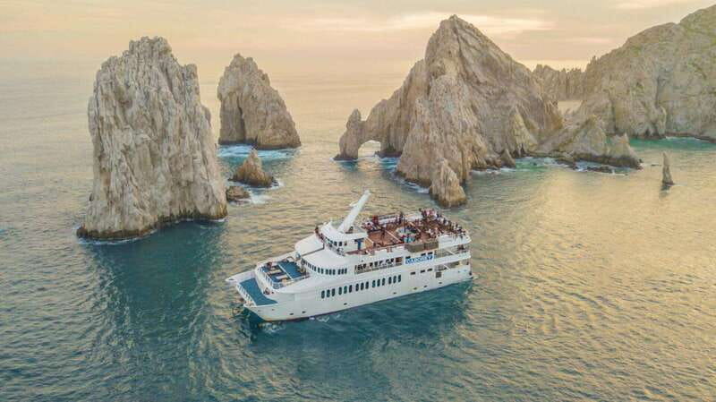 Cabo San Lucas: Sunset Premier Dinner & Show Cruise - Médano Bay and the upper-deck hour