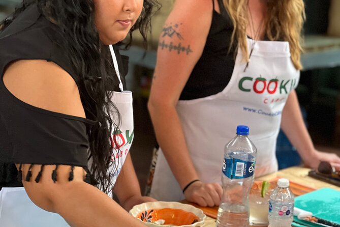 Cabo San Lucas Taco Fiesta: Cooking, Dancing and Mixology Class - Pressing tortillas for the taco feast