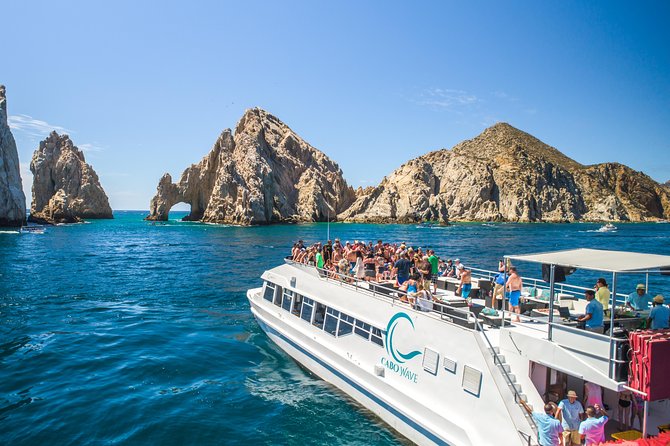 Cabo Sunset Dinner Cruise with Live Music & Open Bar on Cabo Wave - Leaving Cabo Marina for the Arch