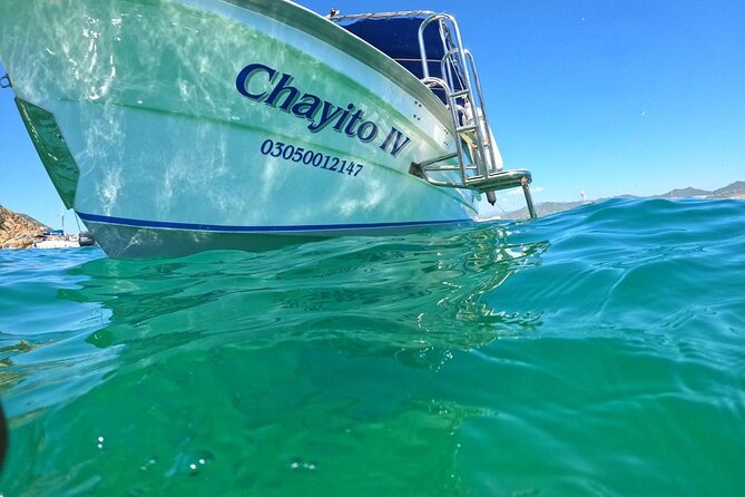 Glass Bottom Boat to the Arch and Lovers Beach: Optional Pickup - From the marina to Pelican Rock