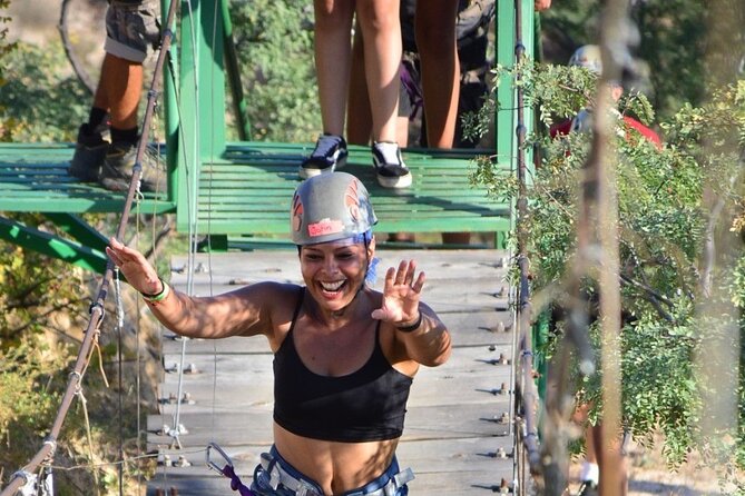 Half-Day San José del Cabo Zip Line and Rappel Adventure - Crossing the suspension bridge