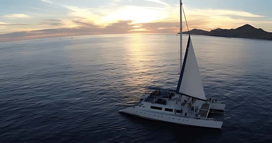 Los Cabos Catamaran: Iconic Sunset Cruise with Drinks & DJ - National Open Bar and the value of $79