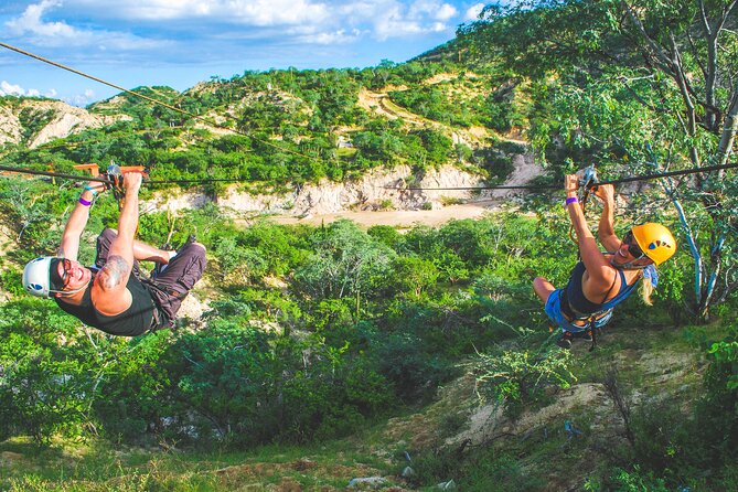 Los Cabos Costa Azul Zipline Eco-Adventure - Rappelling down the natural rock wall