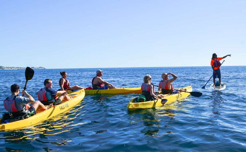 Los Cabos: Private Kayaking and Snorkeling Tour at the Arch - Paddling out in a glass-bottom kayak