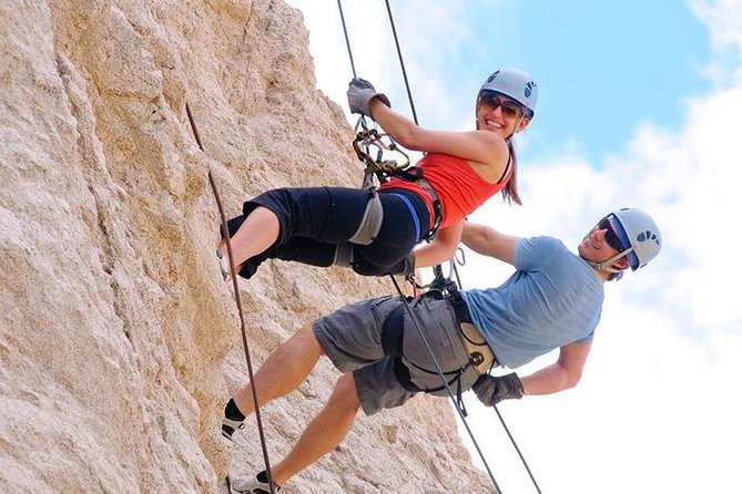 Outdoor Adventure includes Zip-line, Rappelling, Suspension Bridge & more - Rappelling down the mountain wall