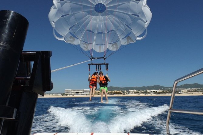 Parasailing - Harnessing up on the 30-foot boat