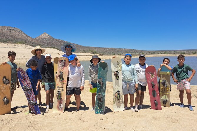 Private Sandboarding Experience in Los Cabos - Two 4x4 trucks, tents, and chairs
