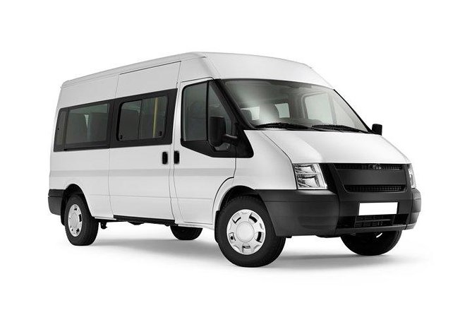 Shared Departure Transfer: Hotel to Los Cabos International Airport - Riding in the 15-person minivan